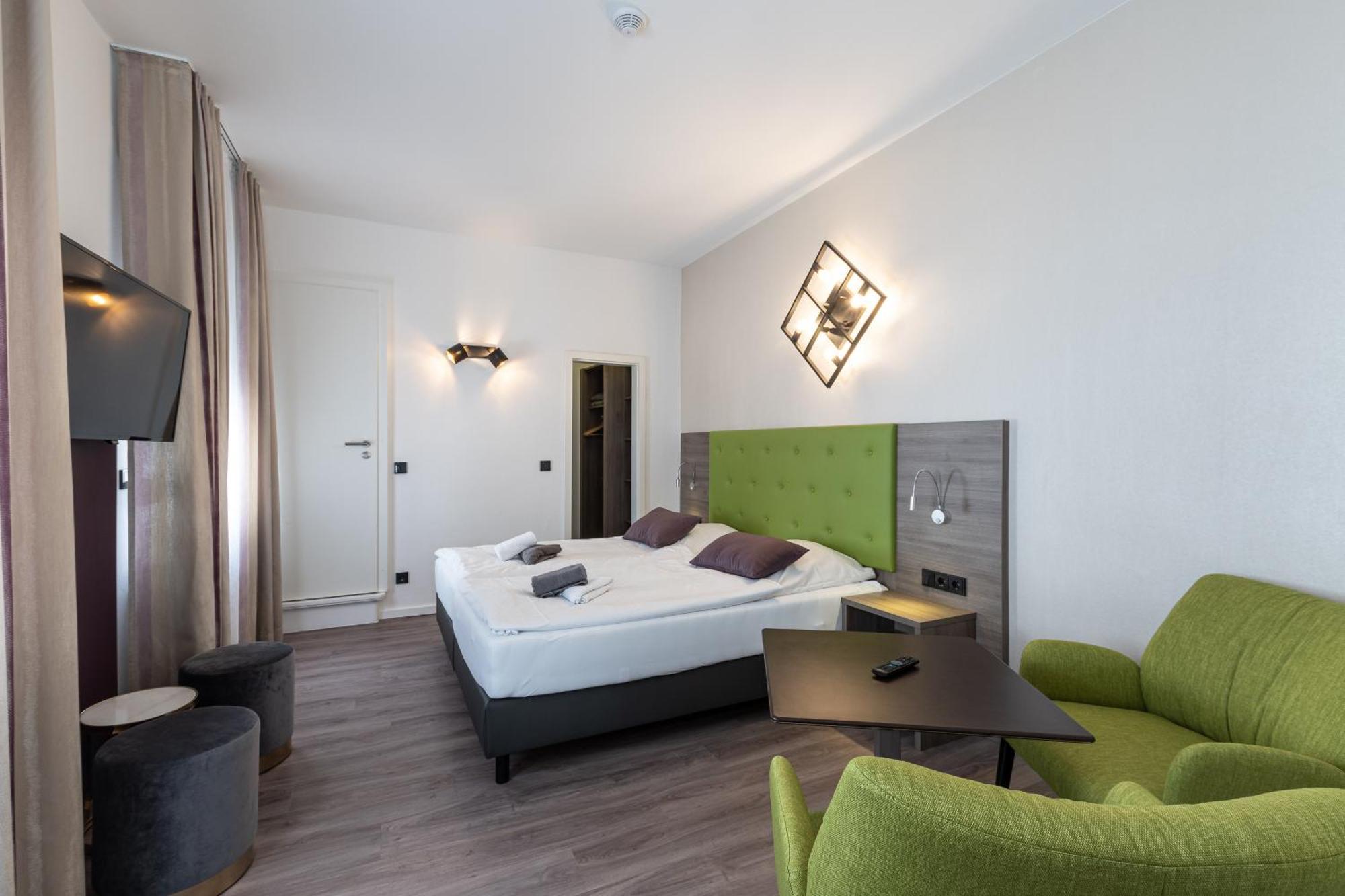 Hotel Porta Nigra Трир Номер фото