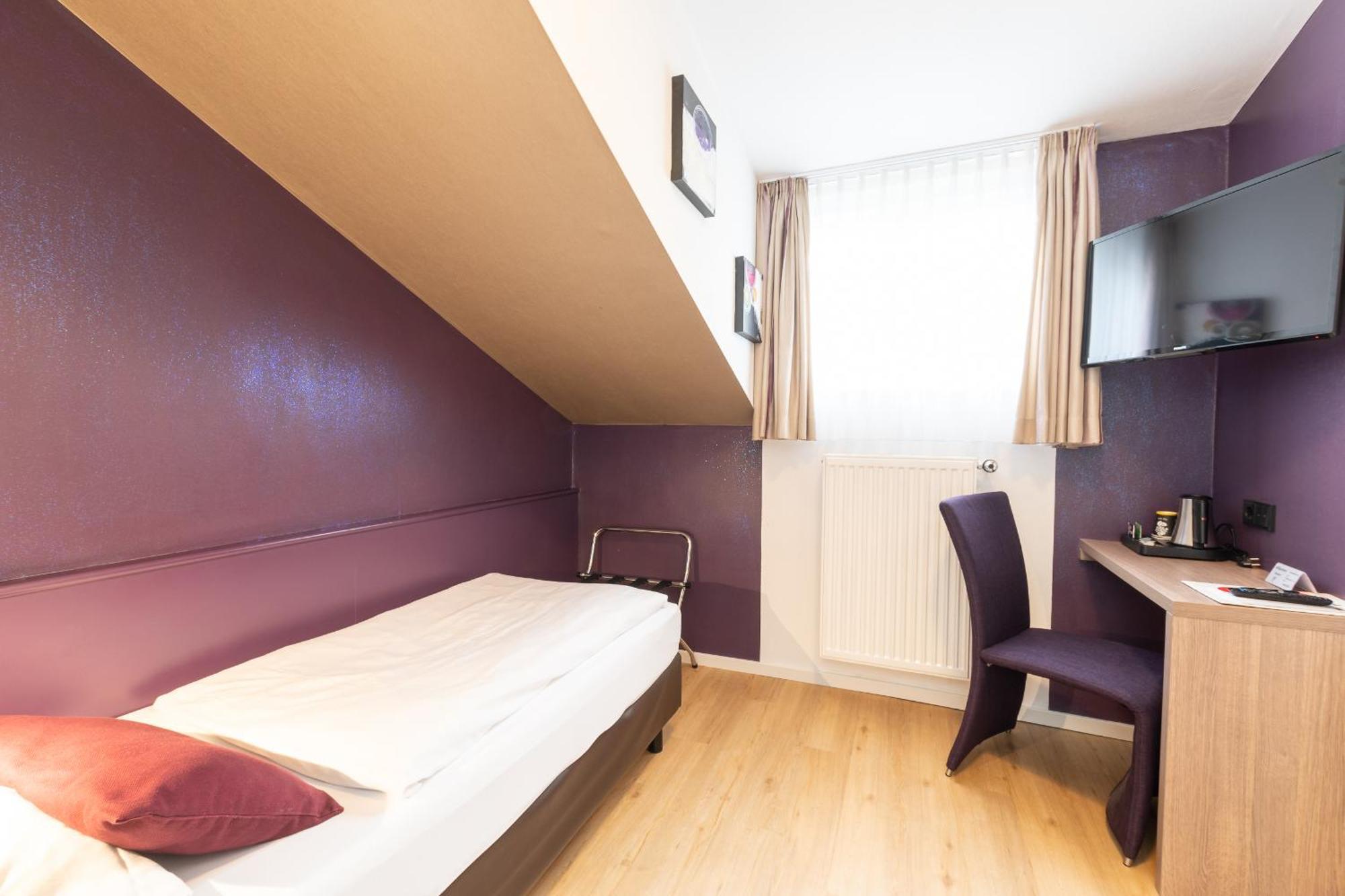 Hotel Porta Nigra Трир Номер фото