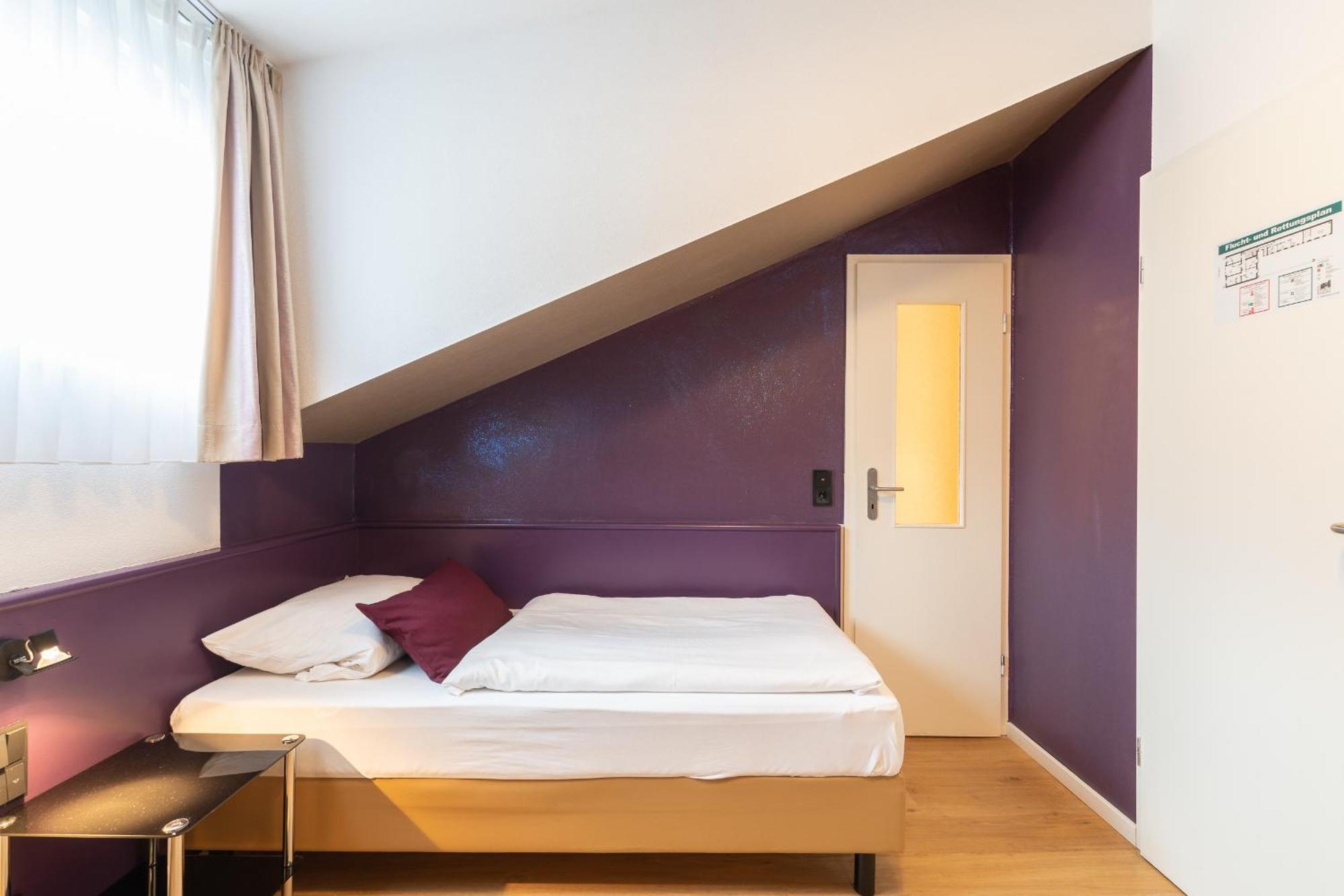 Hotel Porta Nigra Трир Номер фото